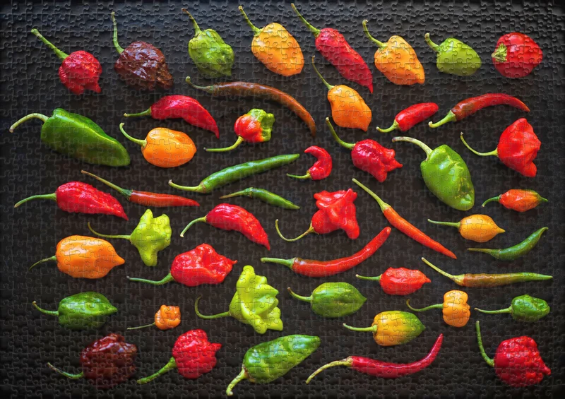 Puzzle 1000 Teile "Buntes Feuer" - scharfe Chilis