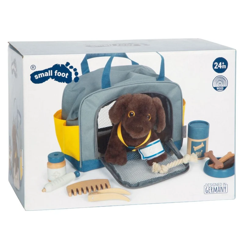Labrador-Hund mit Tasche und Pflege-Set