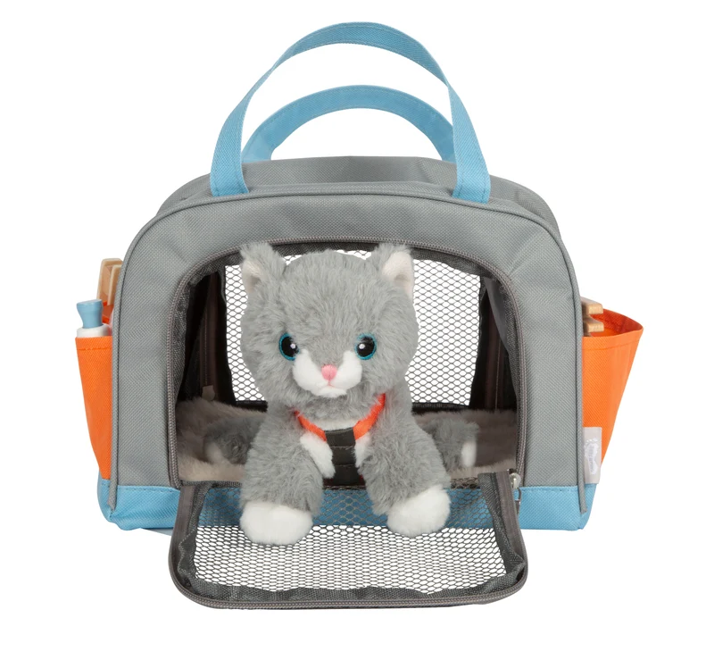 Katze mit Tasche und Pflege-Set