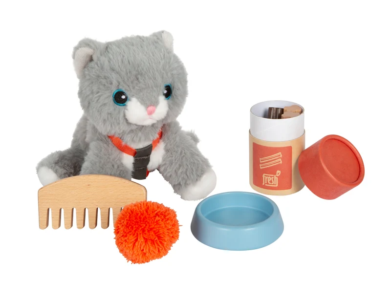 Katze mit Tasche und Pflege-Set