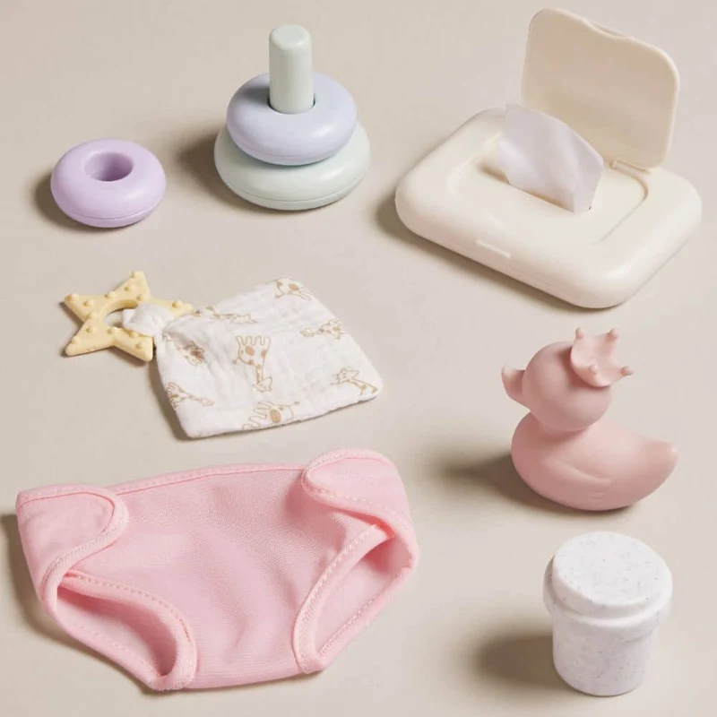 Set zum Wickeln einer Babypuppe mit zusätzlichem Zubehör