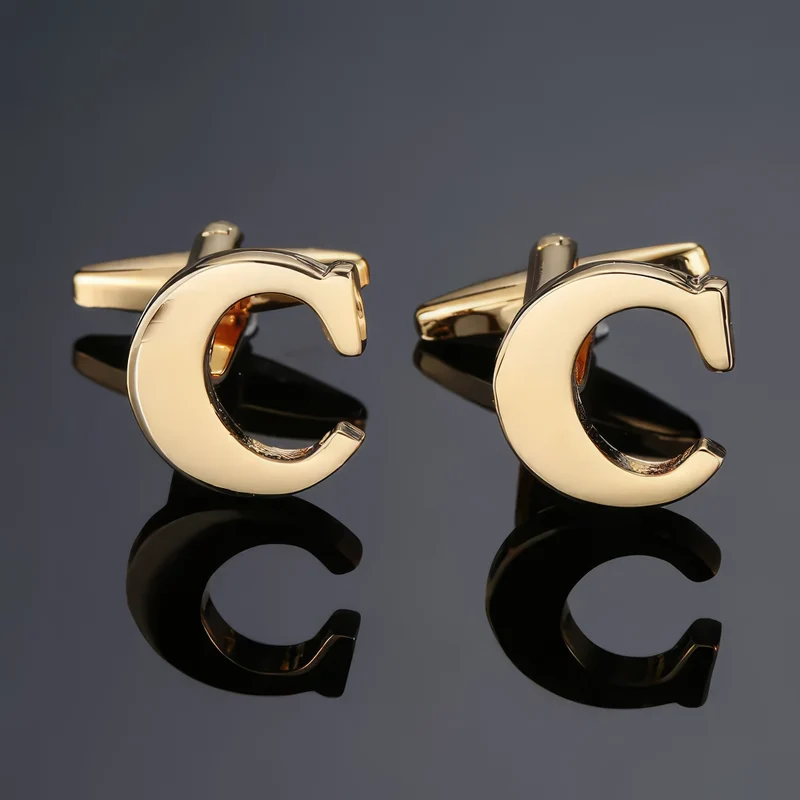 *Buchstabe C Manschettenköpfe, Gold