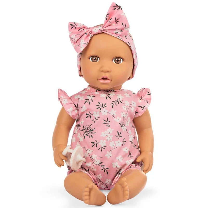 Babypuppe mit Schnuller – In rosa Kleidchen mit Blümchenmuster und Haarband