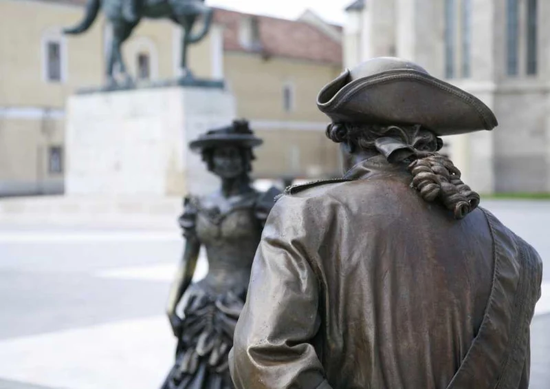 61003 Hintergründe - Bronzestatuen Puzzle