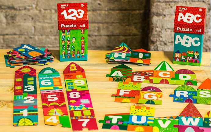 Puzzle im Kartonhaus – Buchstaben 3+