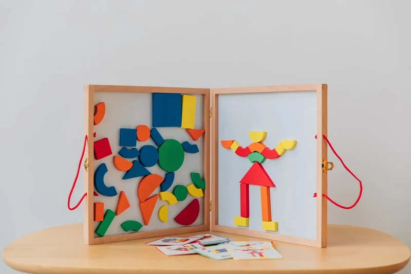 Holzmagnete Puzzle im Koffer – Geoform