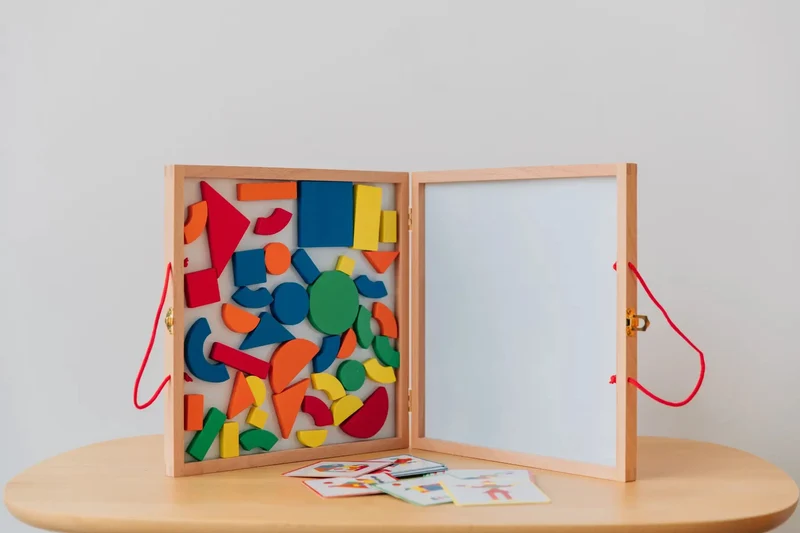 Holzmagnete Puzzle im Koffer – Geoform